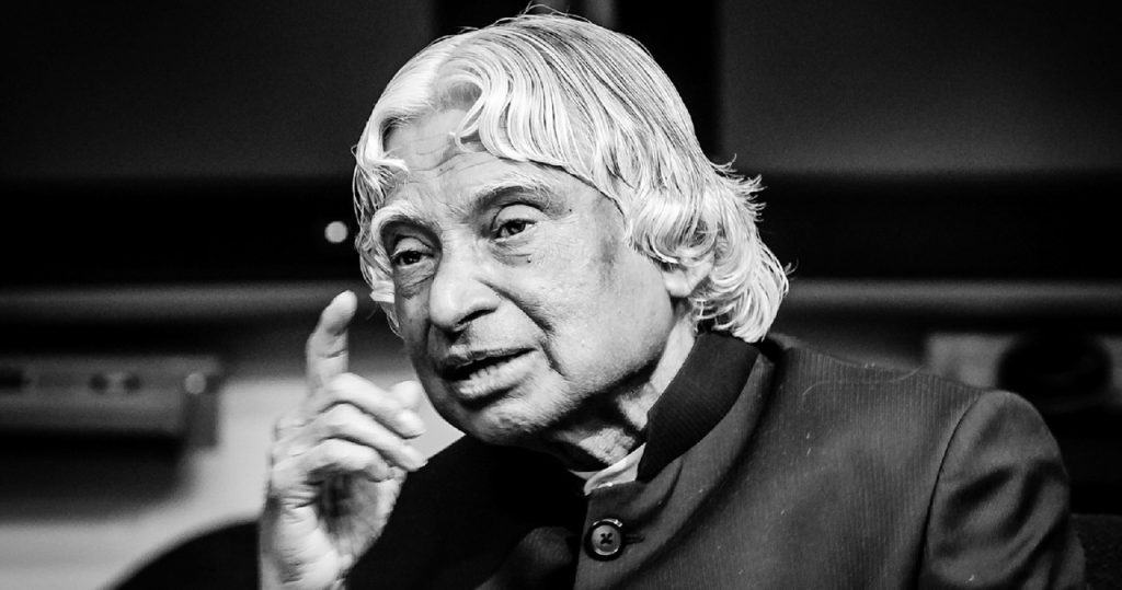 Black-and-white photo of A. P. J. Abdul Kalam speaking and raising a finger