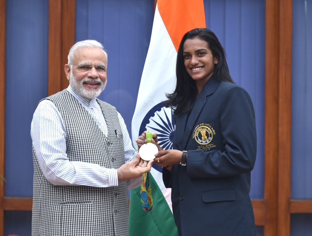 P. V. Sindhu showing her Rio Olympic silver medal to Prime Minister Narendra Modi, 2016