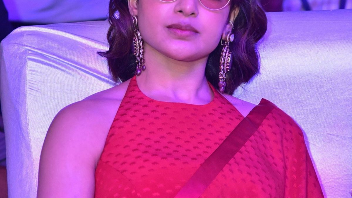 Samantha Ruth Prabhu in a red saree and round tinted glasses at the Kushi music concert