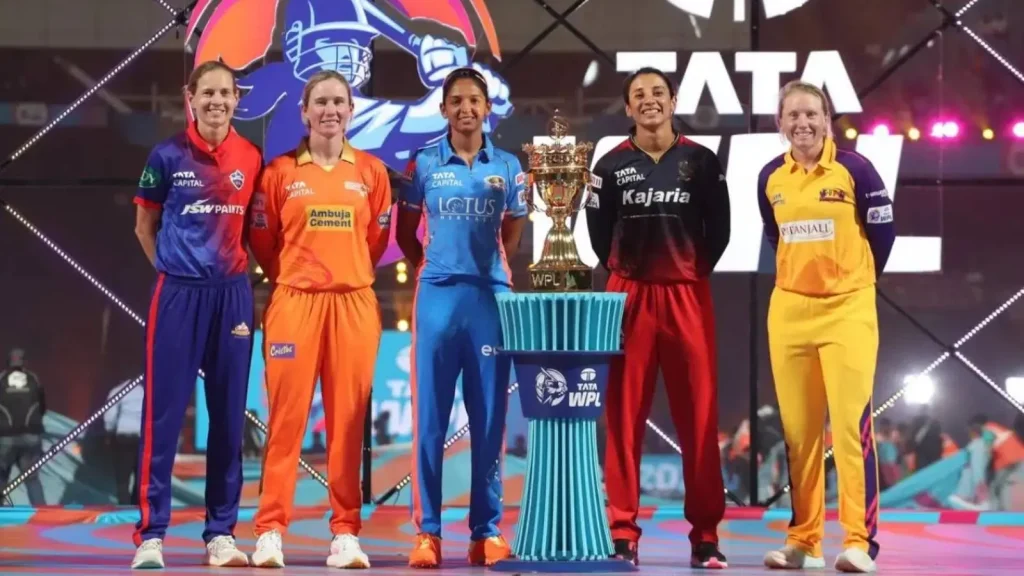 Captains of the five WPL teams with the trophy