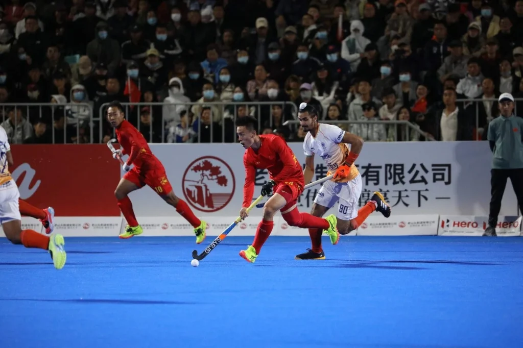 India and China players in action in a hockey match
