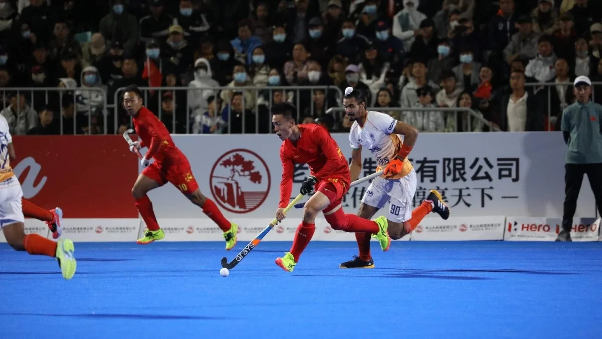 India and China players in action in a hockey match