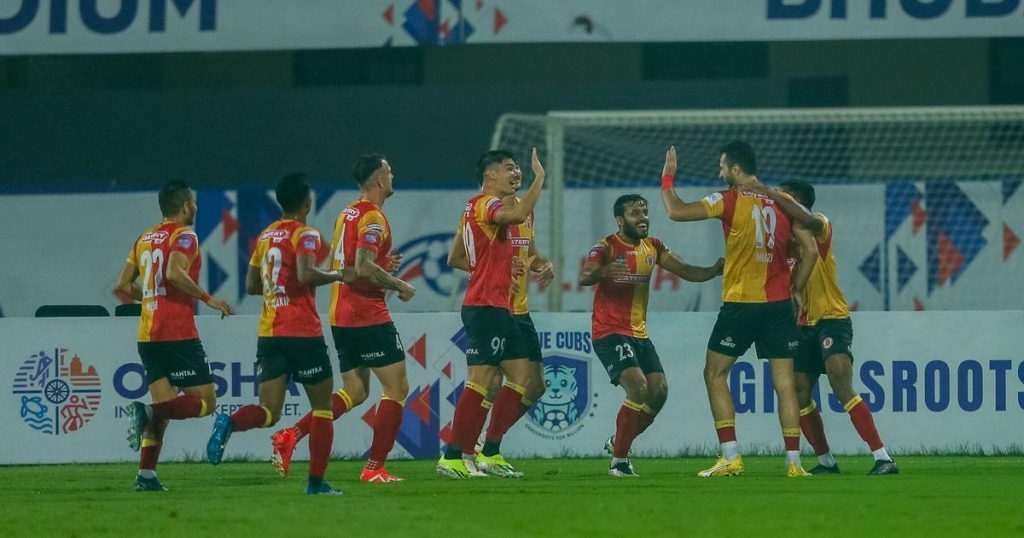 East Bengal players celebrate a goal