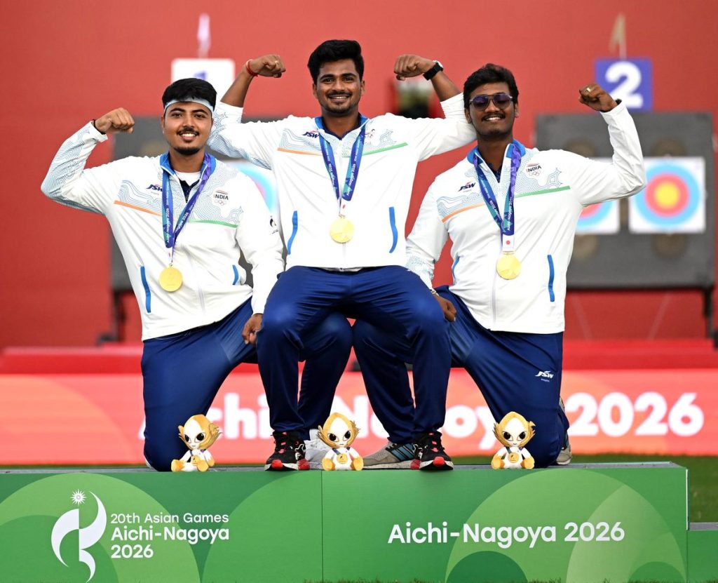 Three Indian archers with gold medals on the podium at the Aichi-Nagoya 2026 Asian Games