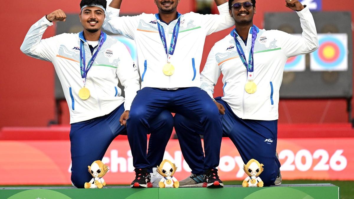 Three Indian archers with gold medals on the podium at the Aichi-Nagoya 2026 Asian Games