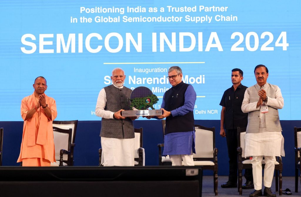 Prime Minister Narendra Modi and Minister Ashwini Vaishnaw on stage at Semicon India 2024