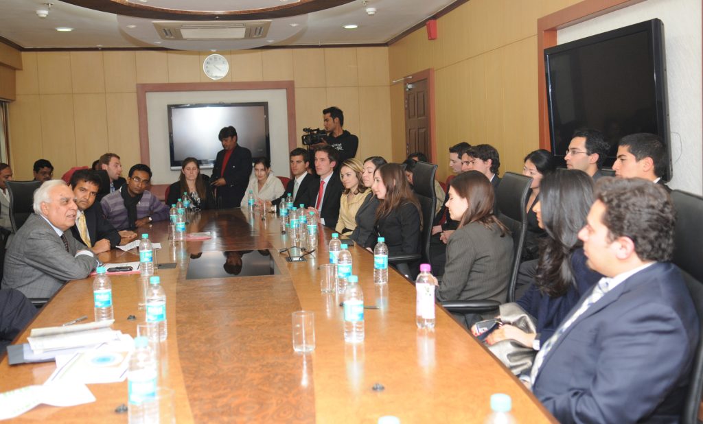 Anand Piramal with Harvard Business School students meeting Union Minister Kapil Sibal