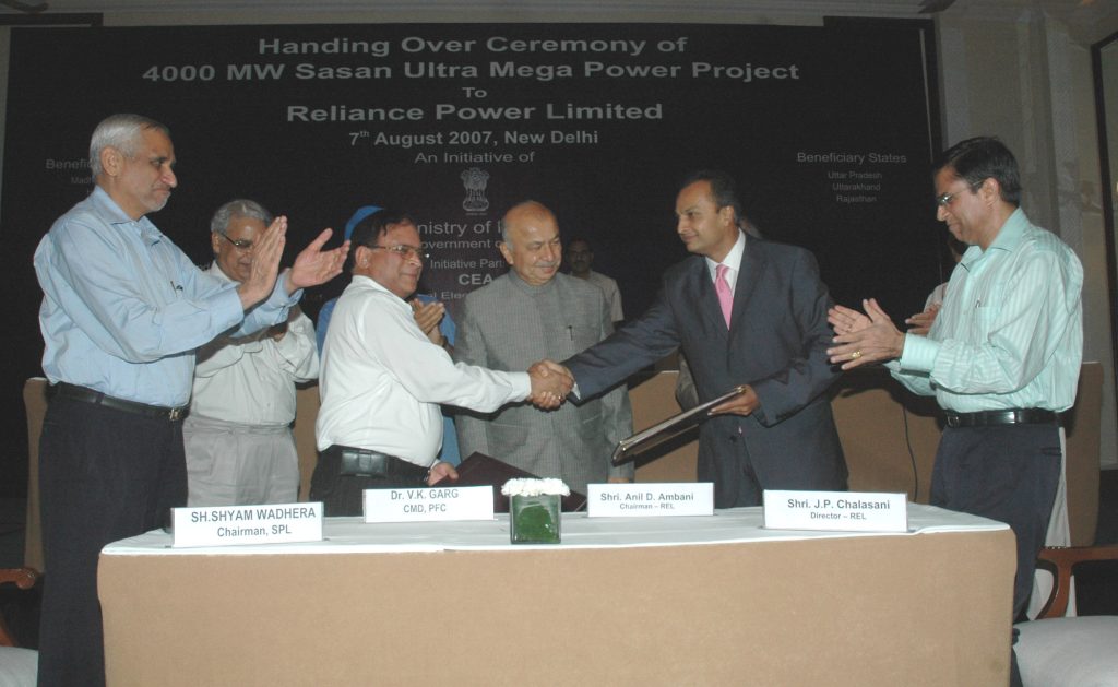 Anil Ambani receiving the Sasan power project from officials in New Delhi