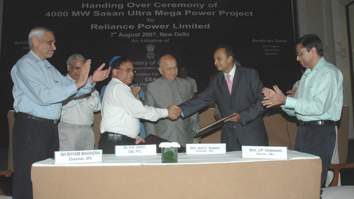 Anil Ambani receiving the Sasan power project from officials in New Delhi