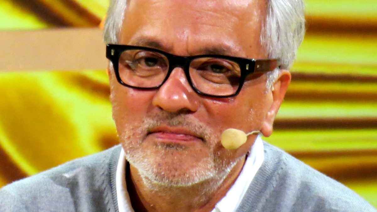 Anish Kapoor in glasses and a dark jacket during an interview