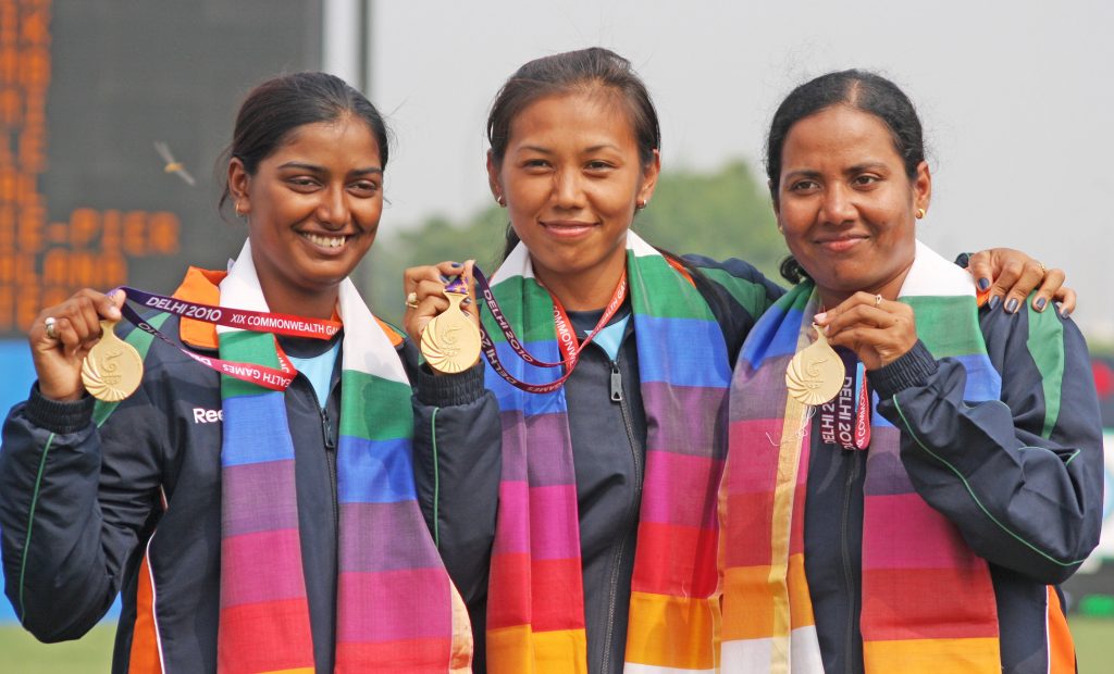 Dola Banerjee, Deepika Kumari and Bombayla Devi with their gold medals