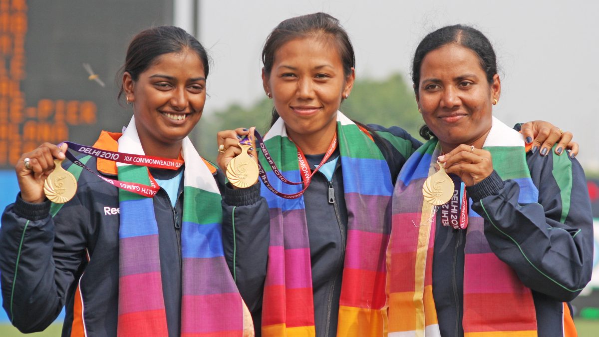 Dola Banerjee, Deepika Kumari and Bombayla Devi with their gold medals