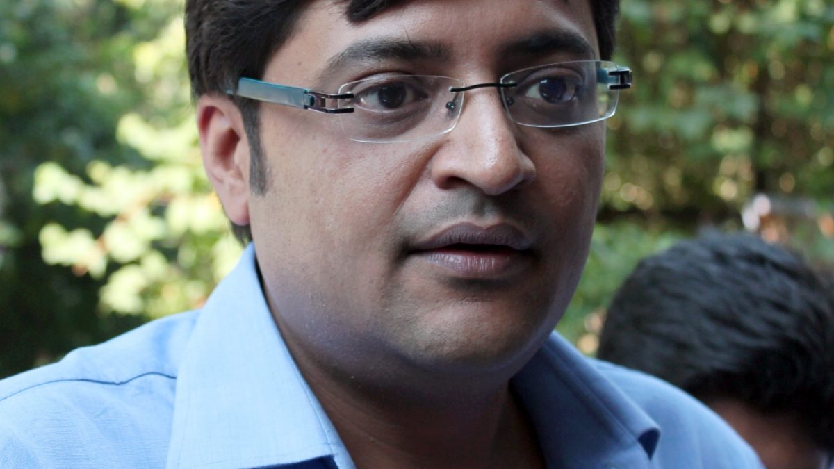 Arnab Goswami in glasses and a blue shirt