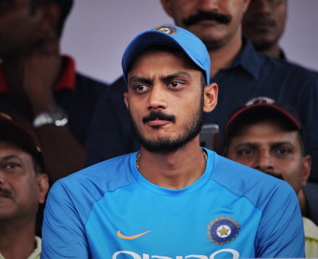 Close-up of Axar Patel in India's blue cap and jersey