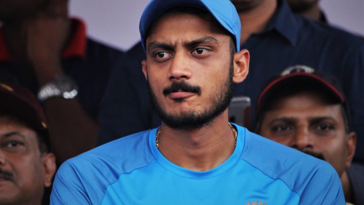 Close-up of Axar Patel in India's blue cap and jersey