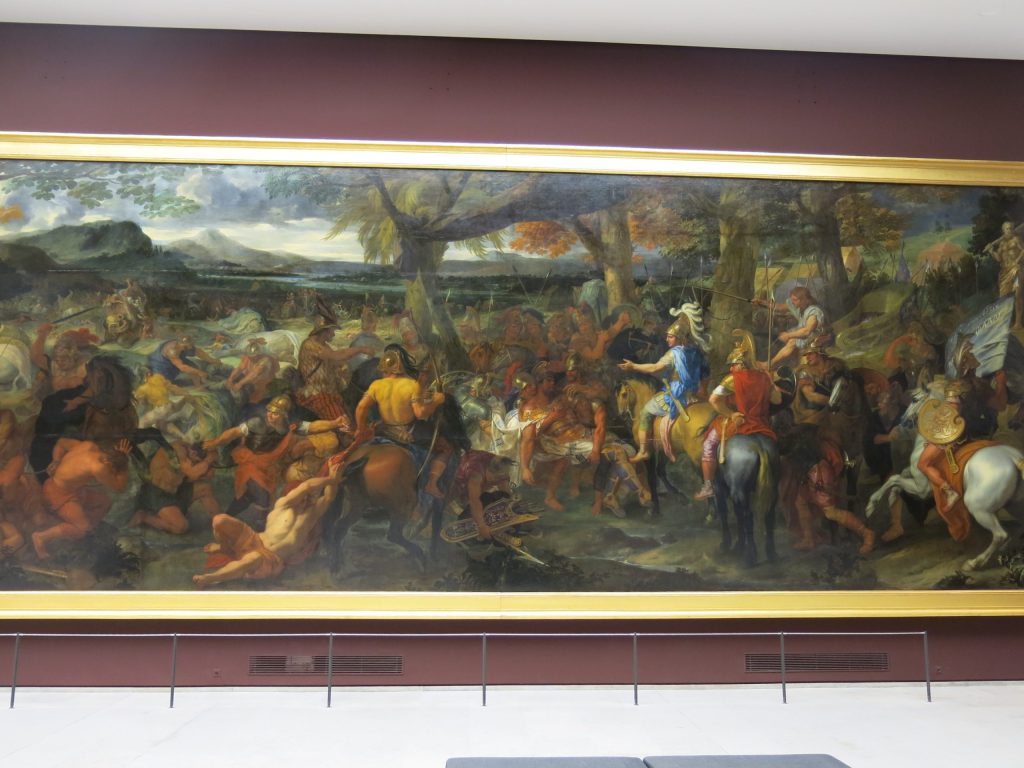 A seventeenth-century painting of the wounded Porus being brought before Alexander after the battle, with soldiers and fallen elephants