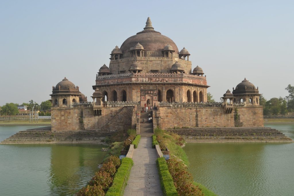 The domed stone tomb of Sher Shah Suri standing in the middle of a lake at Sasaram in Bihar