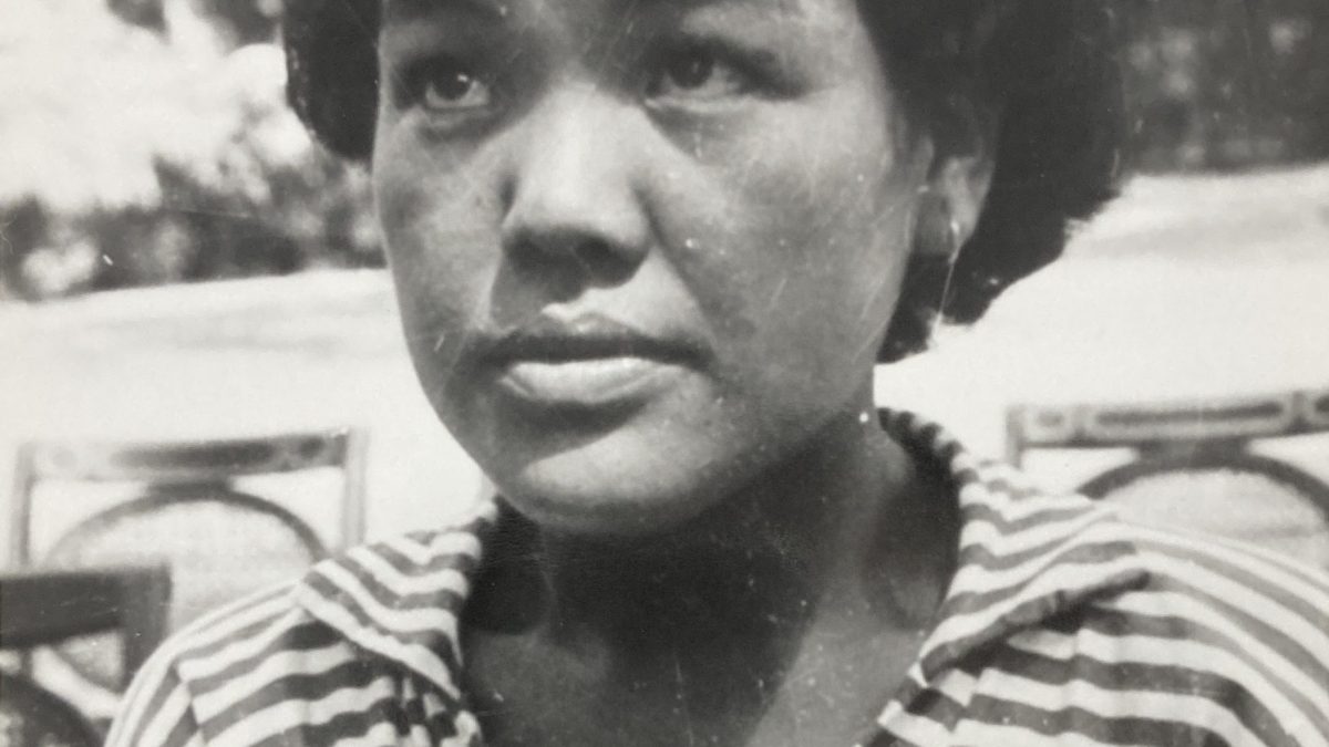 A black-and-white photograph of the young Bachendri Pal in a striped shirt