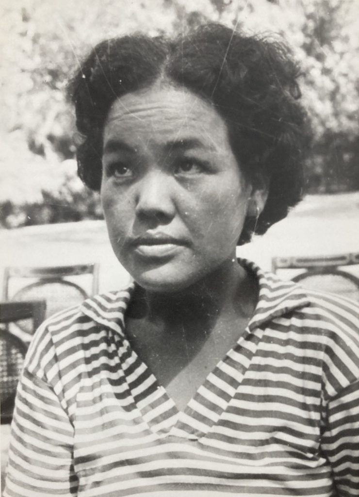 A black-and-white photograph of the young Bachendri Pal in a striped shirt