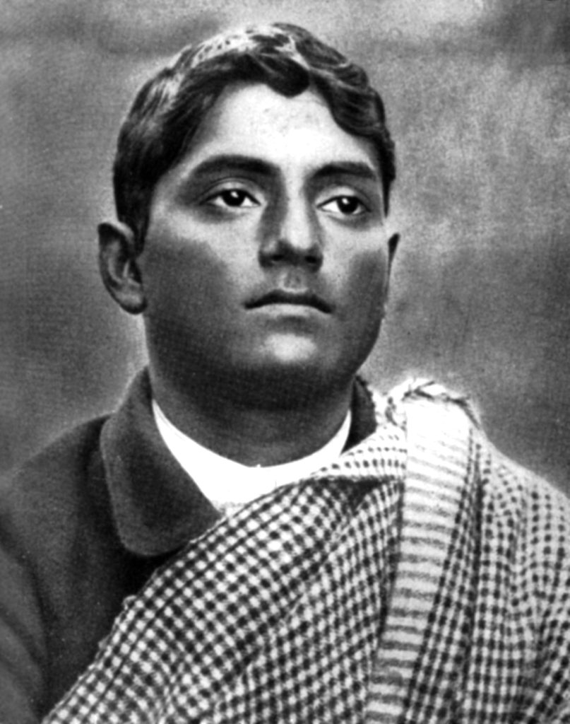Black-and-white portrait of Bagha Jatin as a young man with a checked shawl over his shoulder