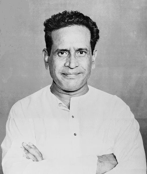 A black-and-white portrait of a young Bhimsen Joshi