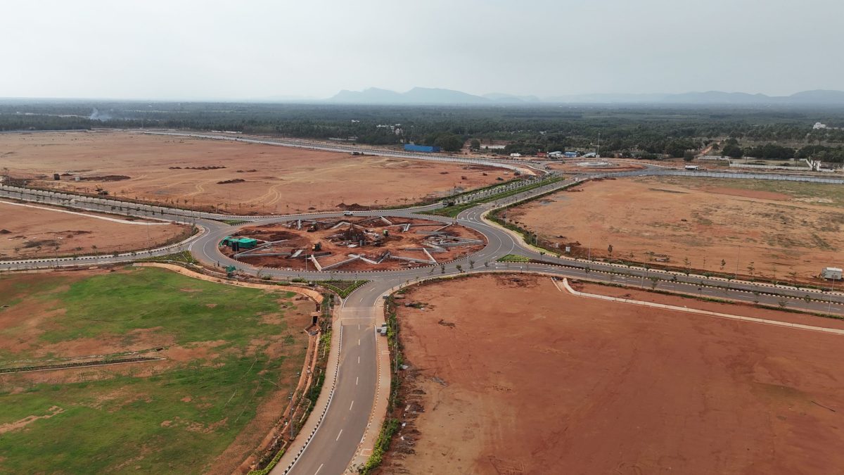 Aerial view of roads and a roundabout under construction near Alluri Sitarama Raju International Airport at Bhogapuram