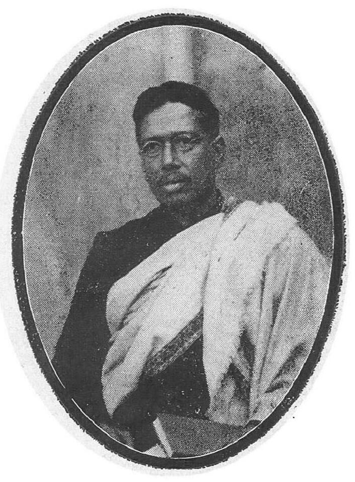 An old oval portrait of Bipin Chandra Pal with a shawl over his shoulder