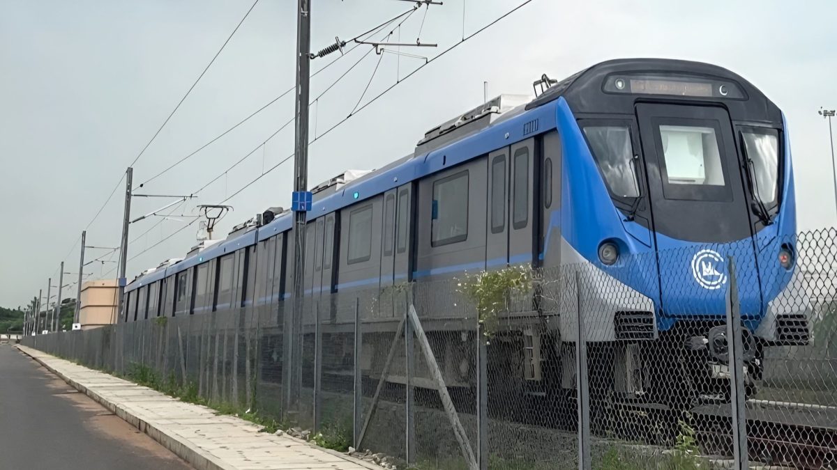 A blue Chennai Metro Rail phase II train on an elevated track