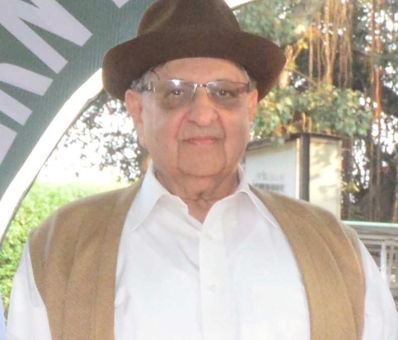 Cyrus Poonawalla in a hat, glasses and a waistcoat