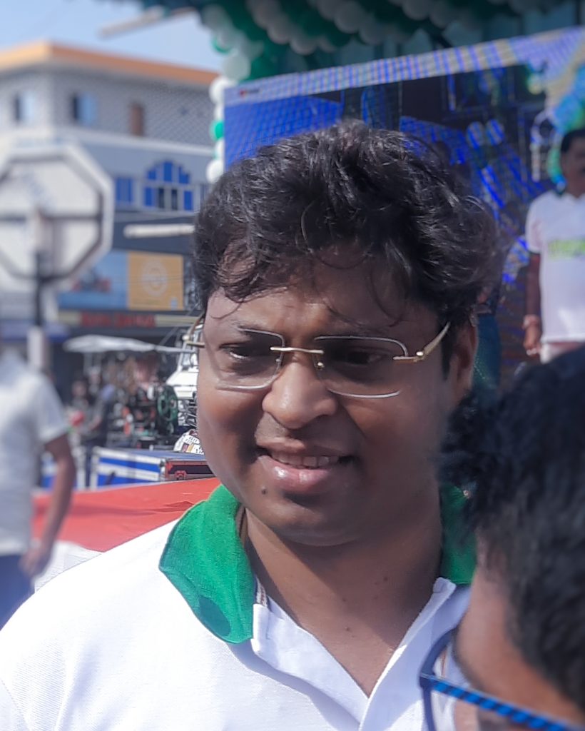 Dilip Tirkey in glasses, smiling