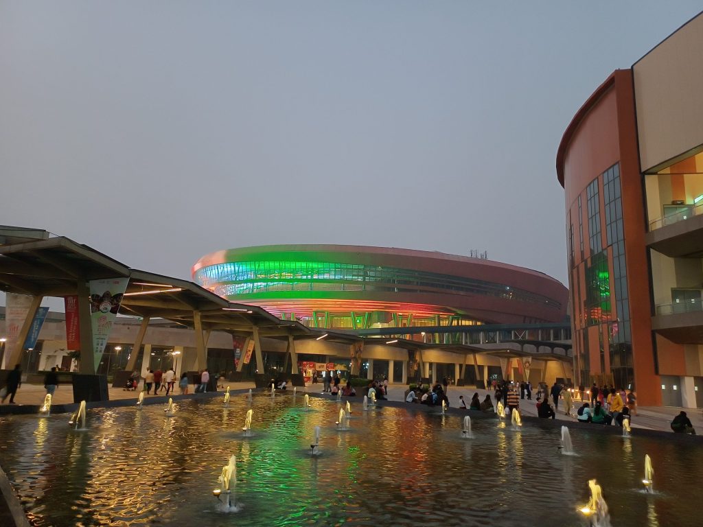 Bharat Mandapam illuminated at night