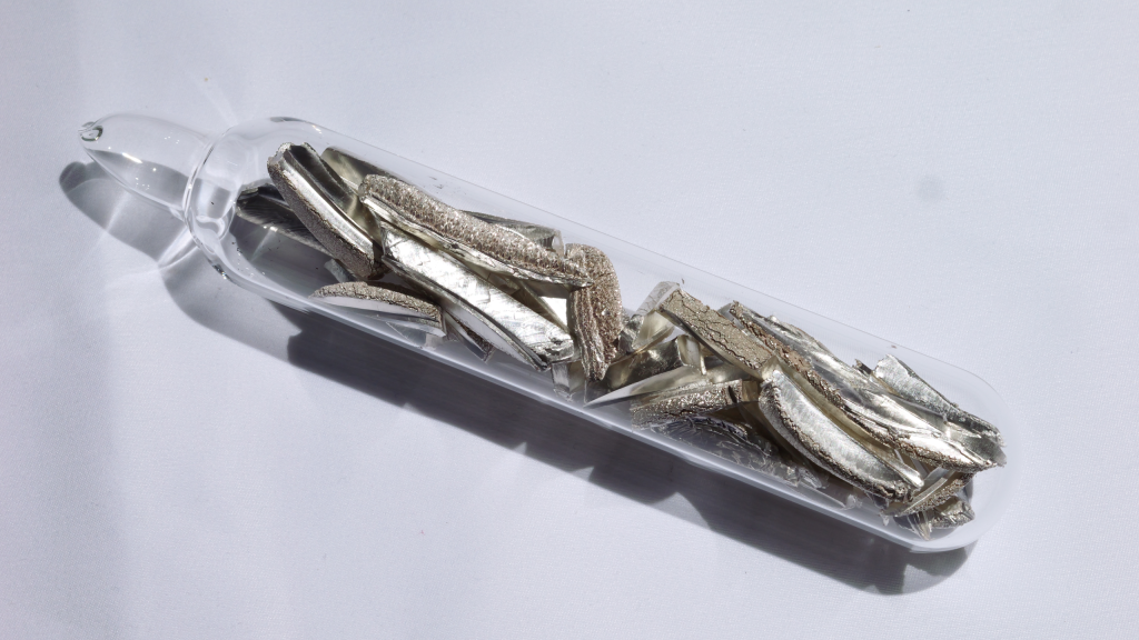 Purified lithium metal sealed in a glass ampoule