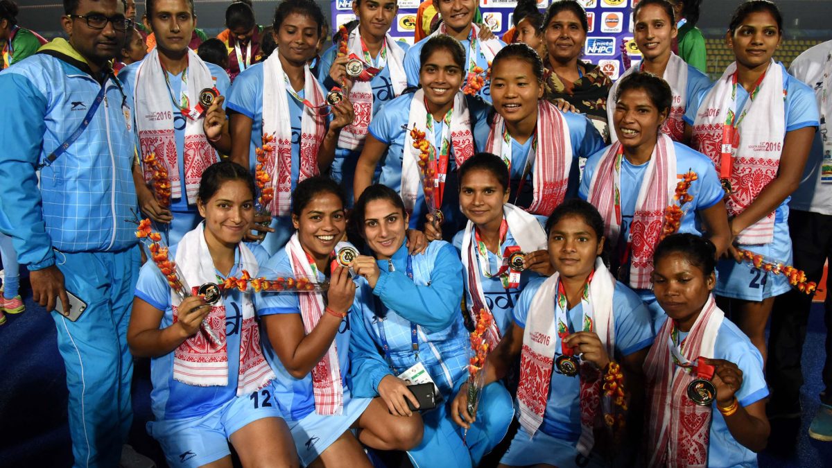 The Indian women's hockey team celebrating with gold medals