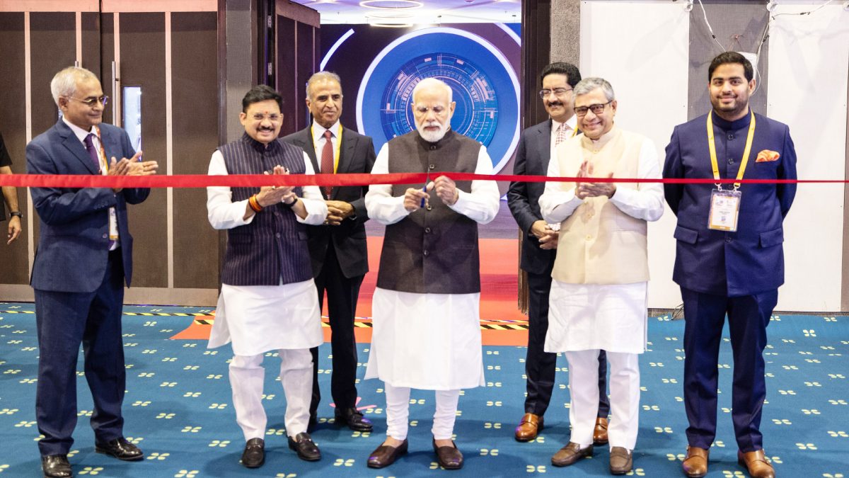 A ribbon-cutting ceremony at India Mobile Congress