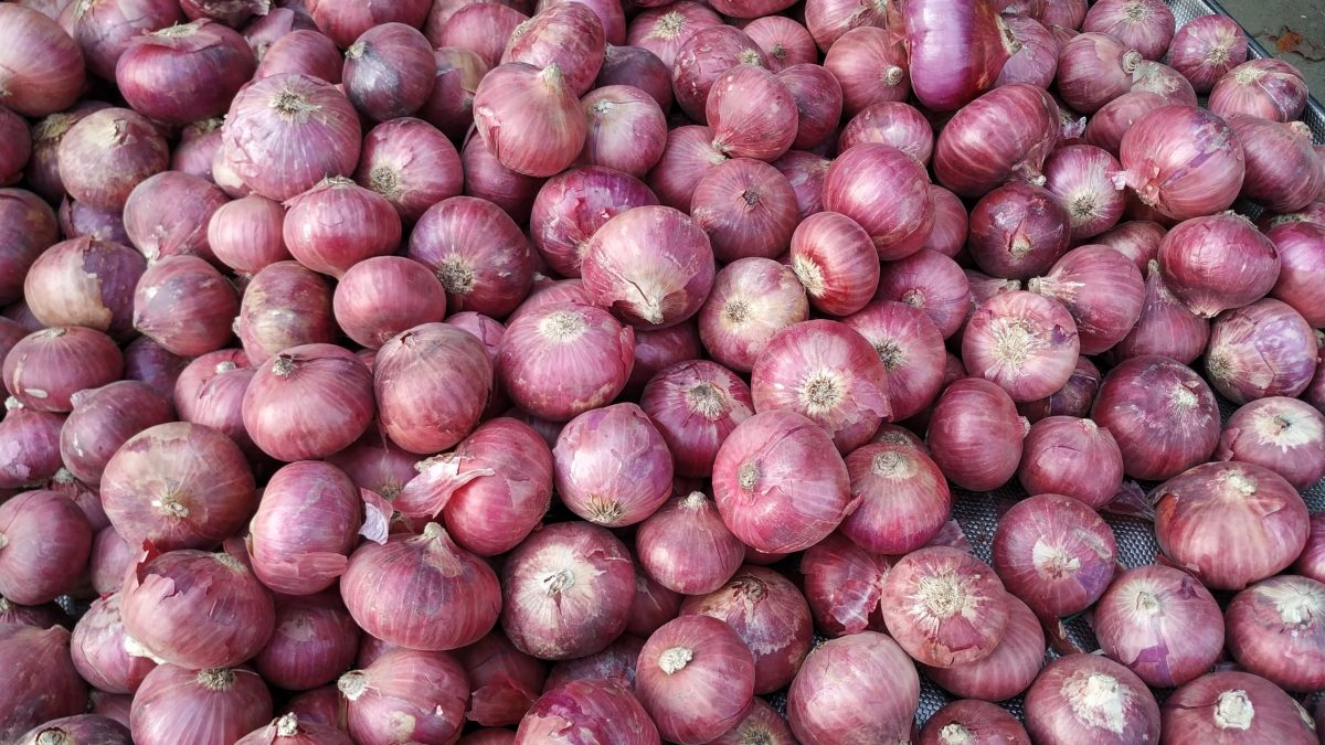 Onions piled on a trolley at an Indian market