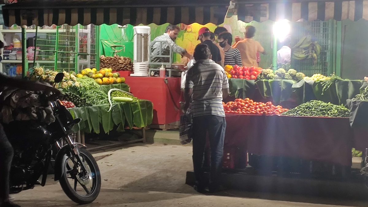A wholesale vegetable shop at night in Rajahmundry