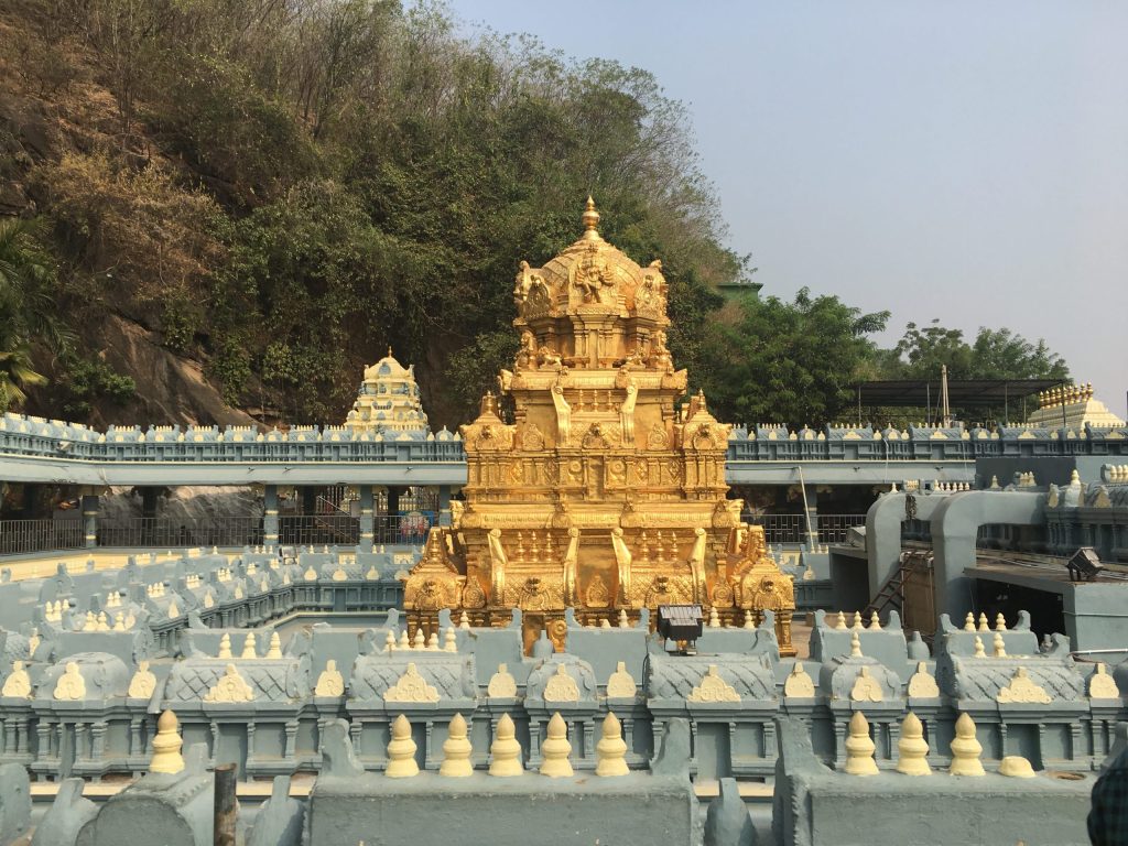 A golden gopuram model at the Kanaka Durga temple complex on Indrakeeladri in Vijayawada