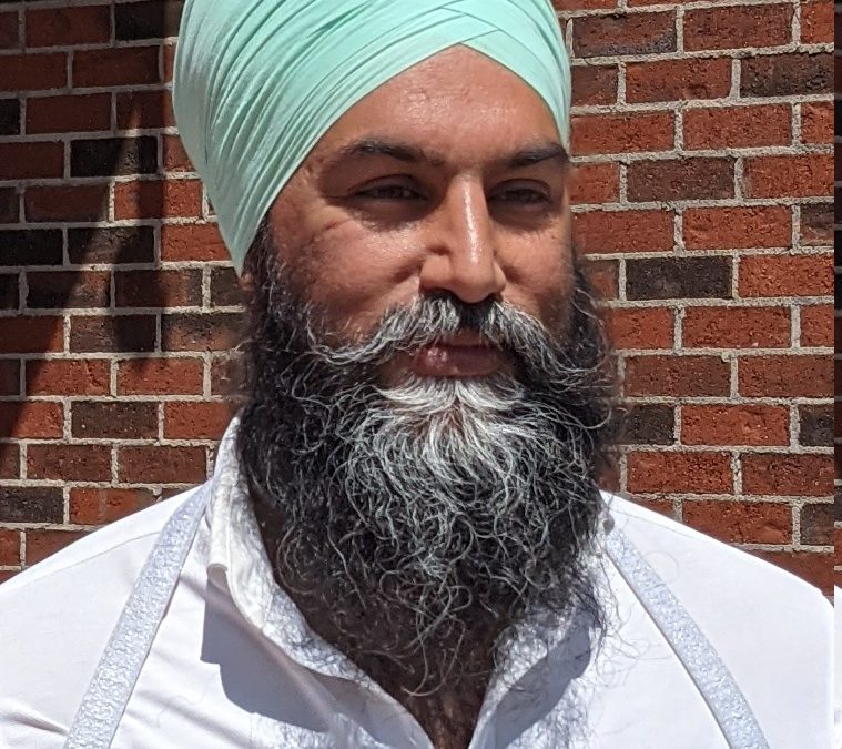 Jagmeet Singh in a turban and suit at a campaign event