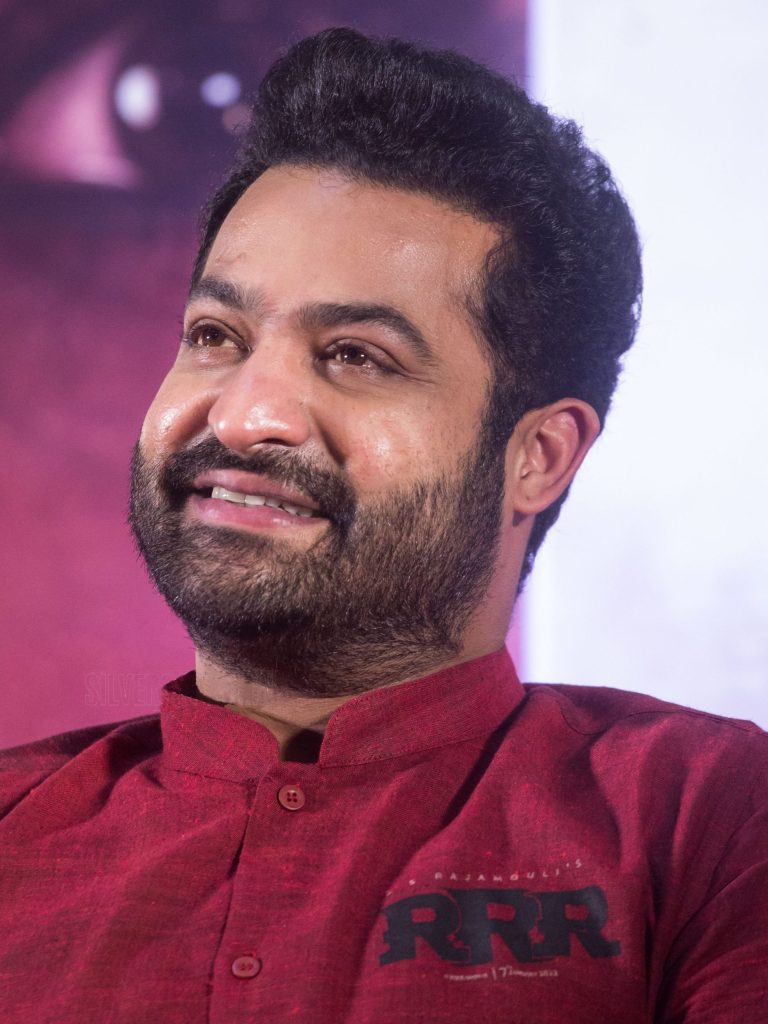 Jr NTR smiling at the RRR press meet in Chennai