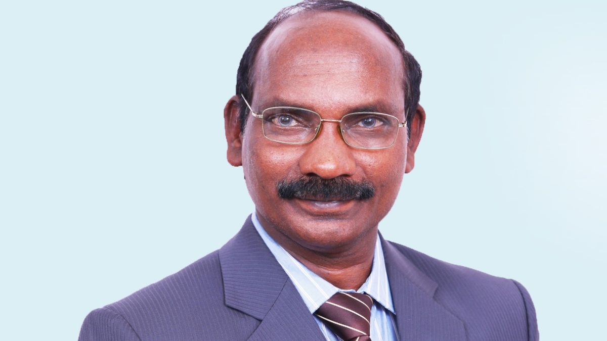 Portrait of K. Sivan in a suit and tie, smiling
