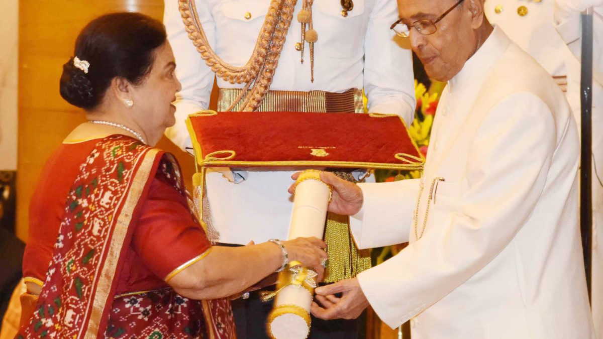 Kokilaben Ambani receiving the Padma Vibhushan from President Pranab Mukherjee