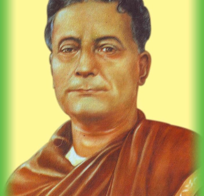 A painted portrait of Lakshminath Bezbaroa with a shawl over his shoulder