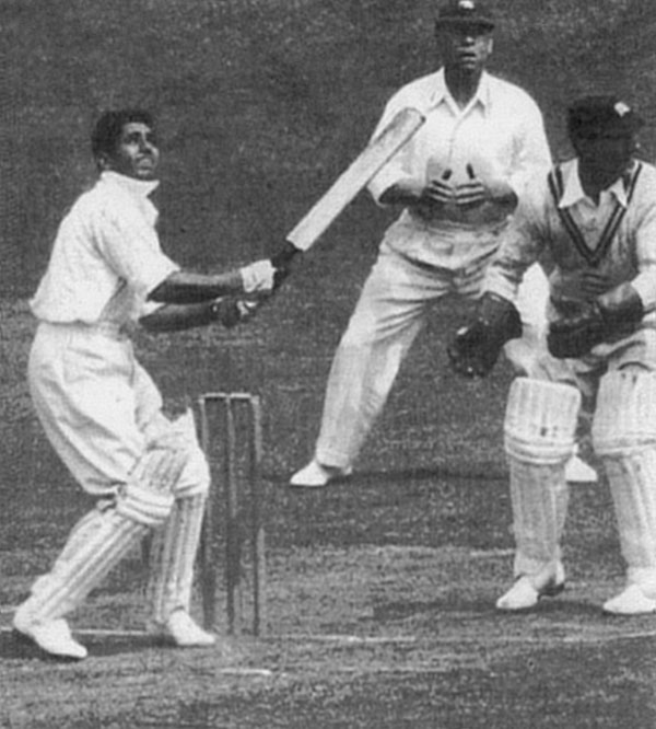 A black-and-white photograph of Lala Amarnath batting