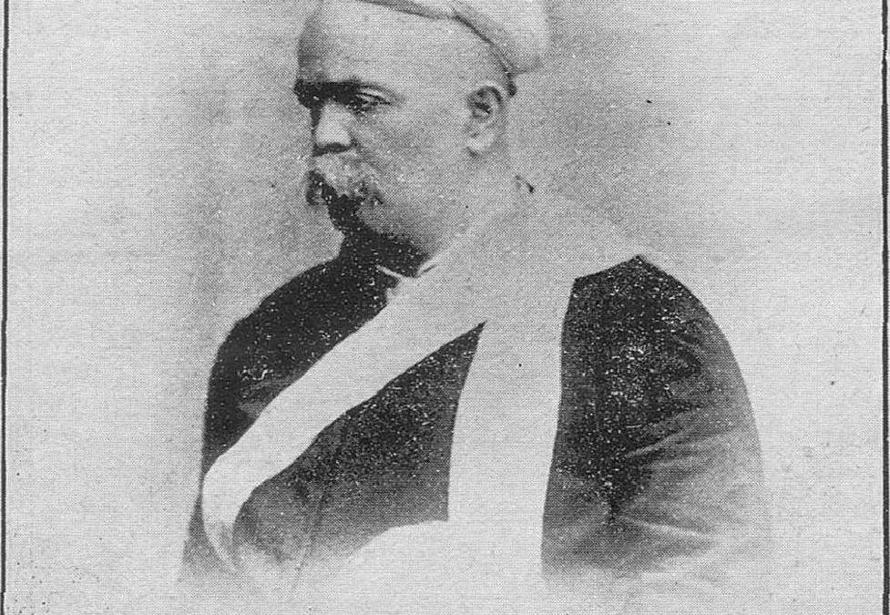 An old printed portrait of Mahadev Govind Ranade in a turban