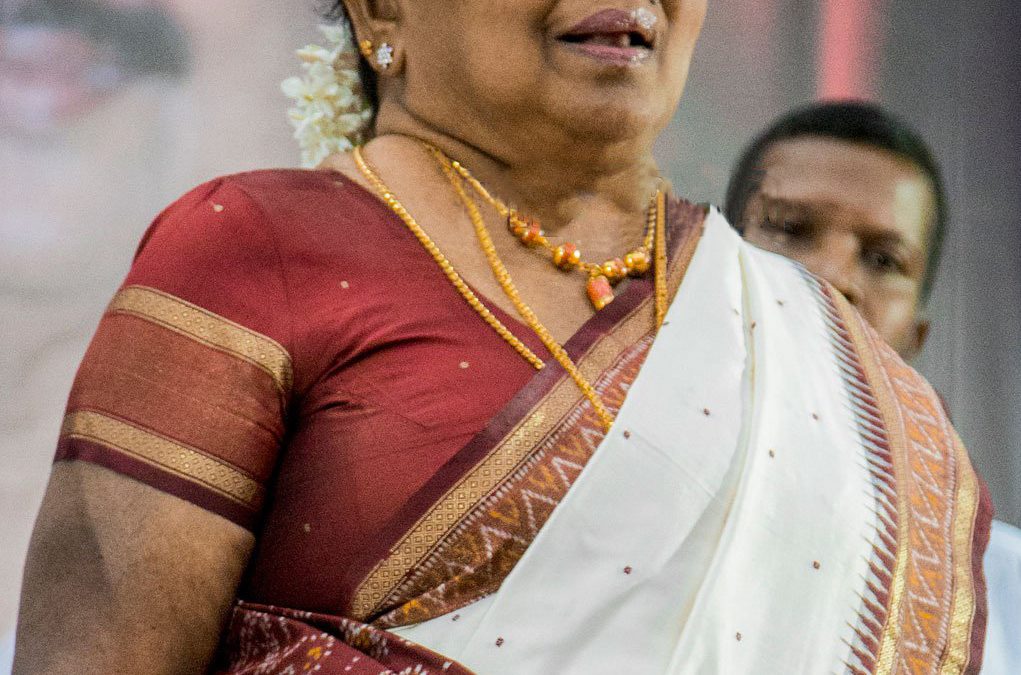 Manorama in a white and red silk sari at a public function