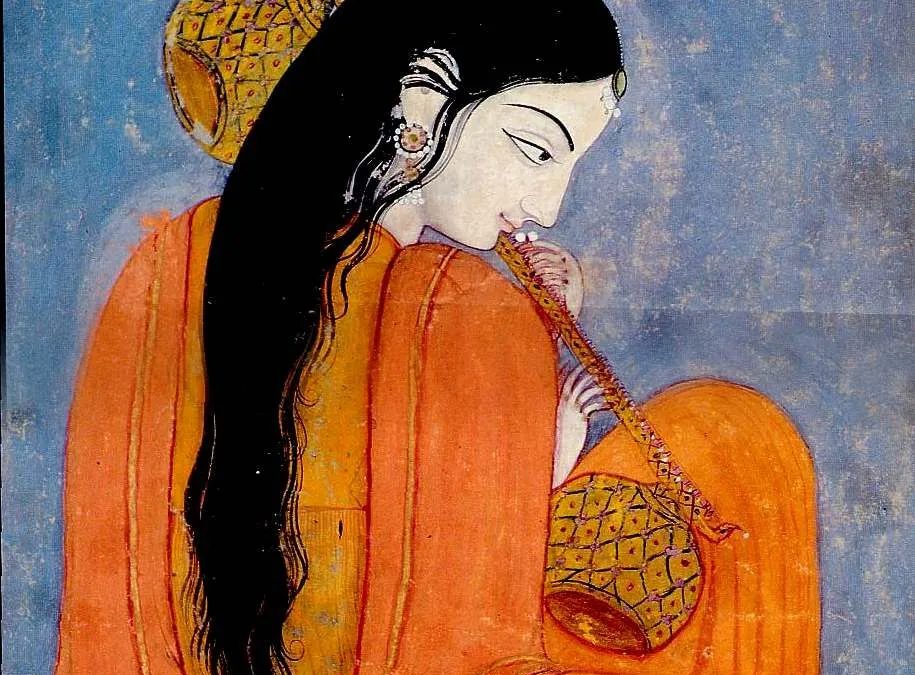 A Kangra painting of Mirabai in an orange robe, her long hair loose, bent over a stringed instrument