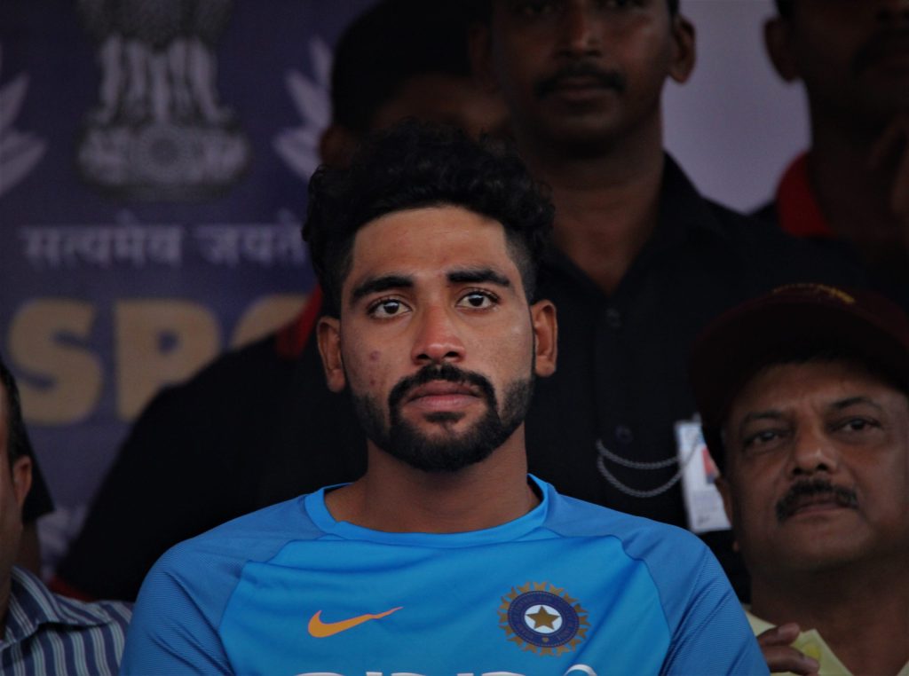 Close-up of Mohammed Siraj with a beard in India's blue jersey