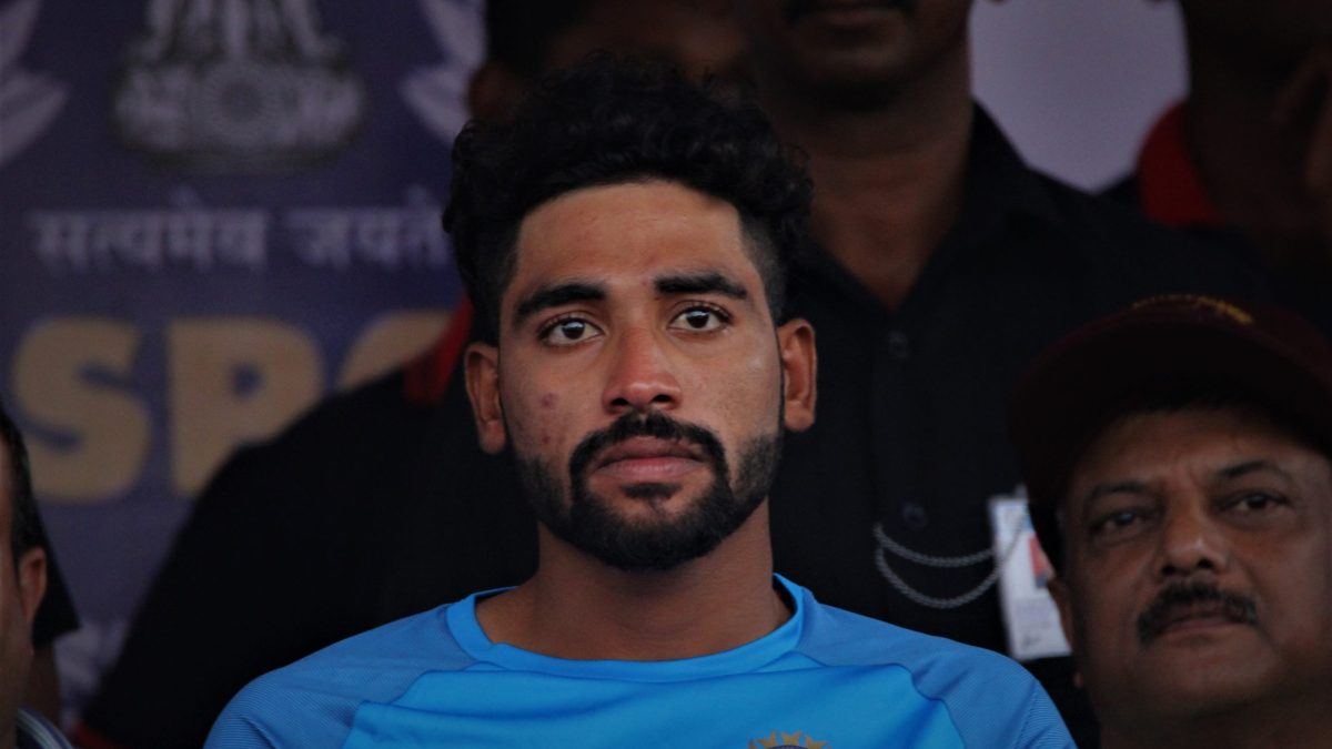Close-up of Mohammed Siraj with a beard in India's blue jersey