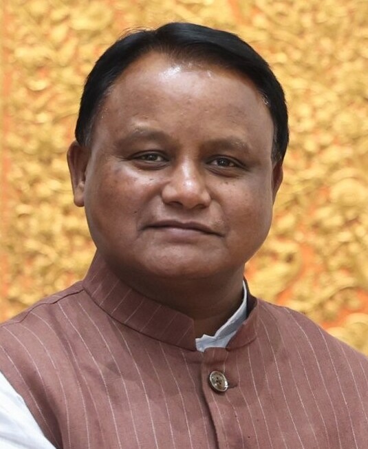 Mohan Charan Majhi in a brown waistcoat