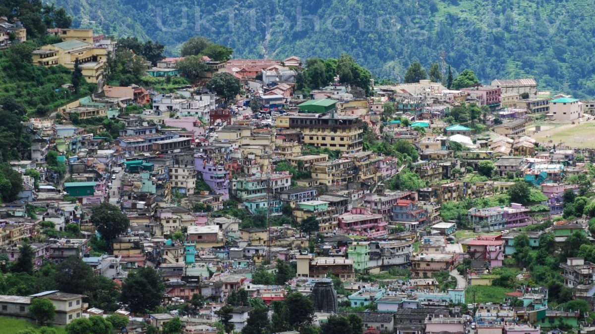 Houses of Gopeshwar town spread across a green Himalayan hillside in Chamoli district